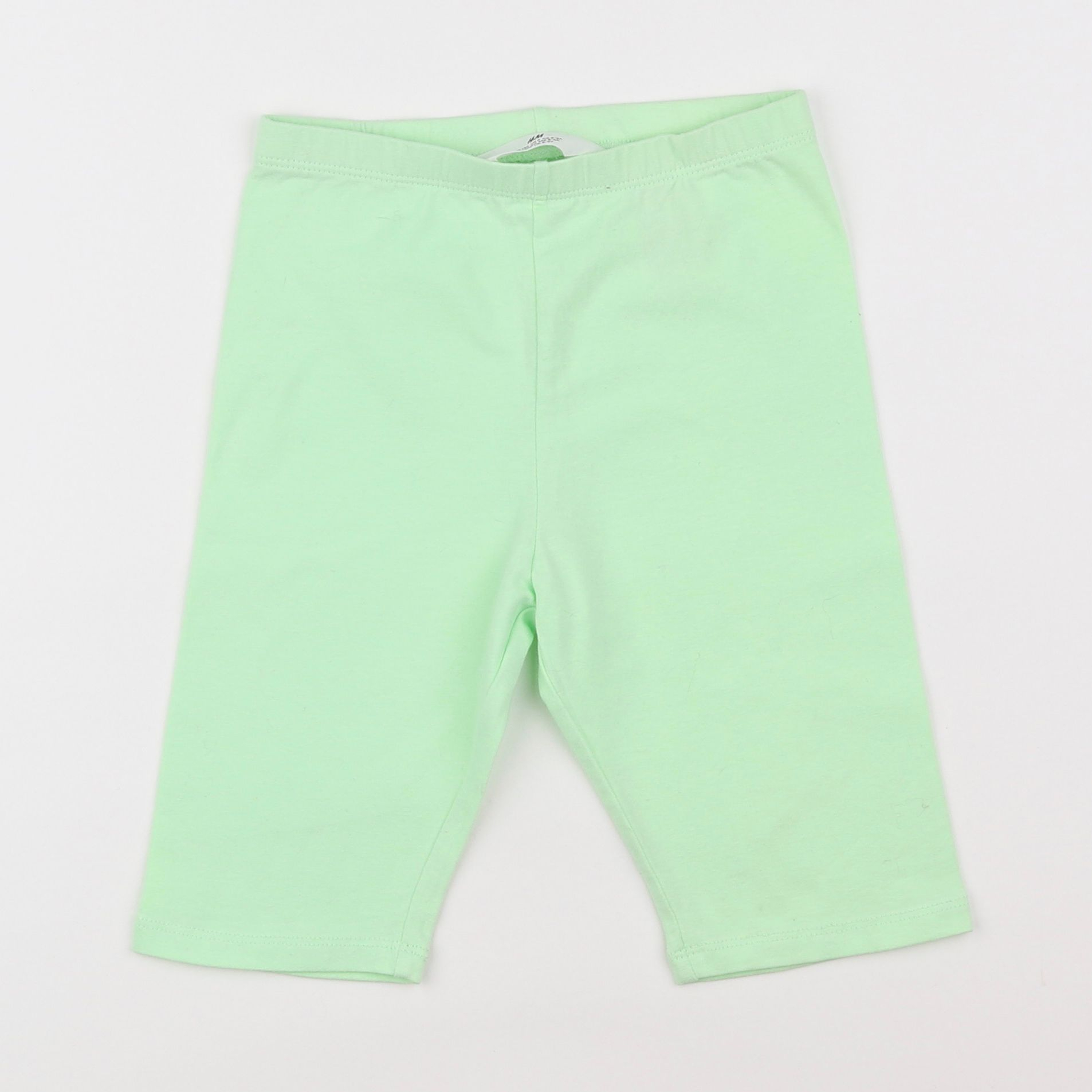 H&M - legging court vert - 8/9 ans